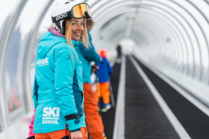 ski instructor Oxygène on ski lift carpet
