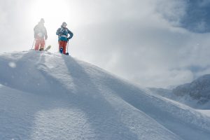 offpiste terrain first tracks skiers