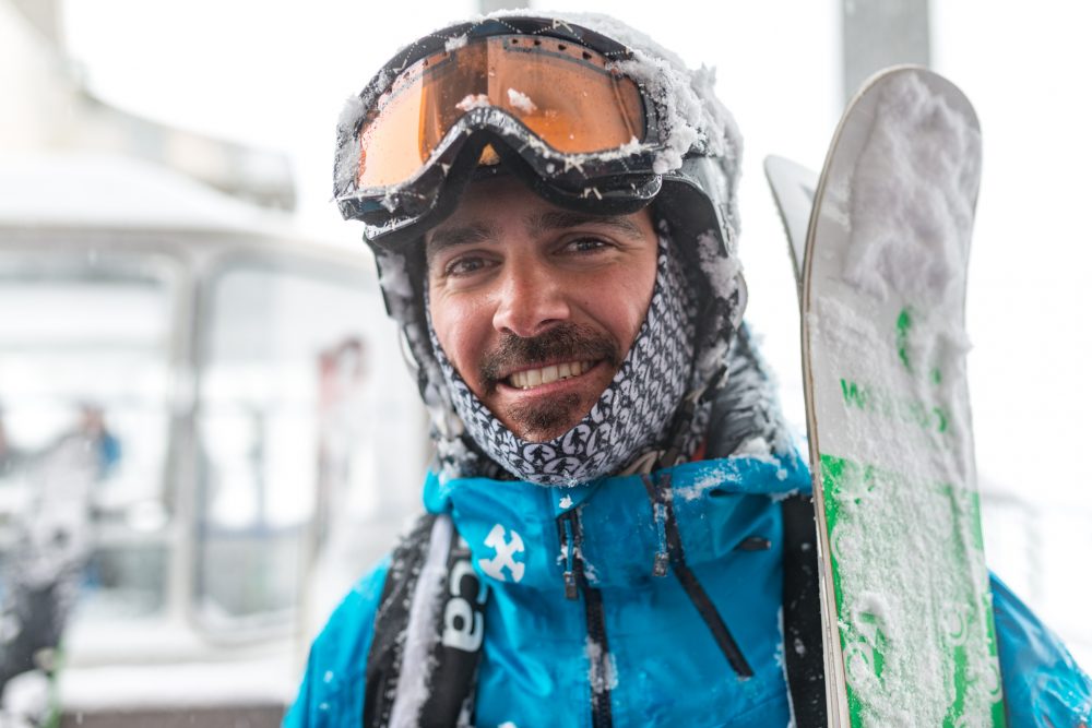 ski instructor wearing warm ski neckwarmers